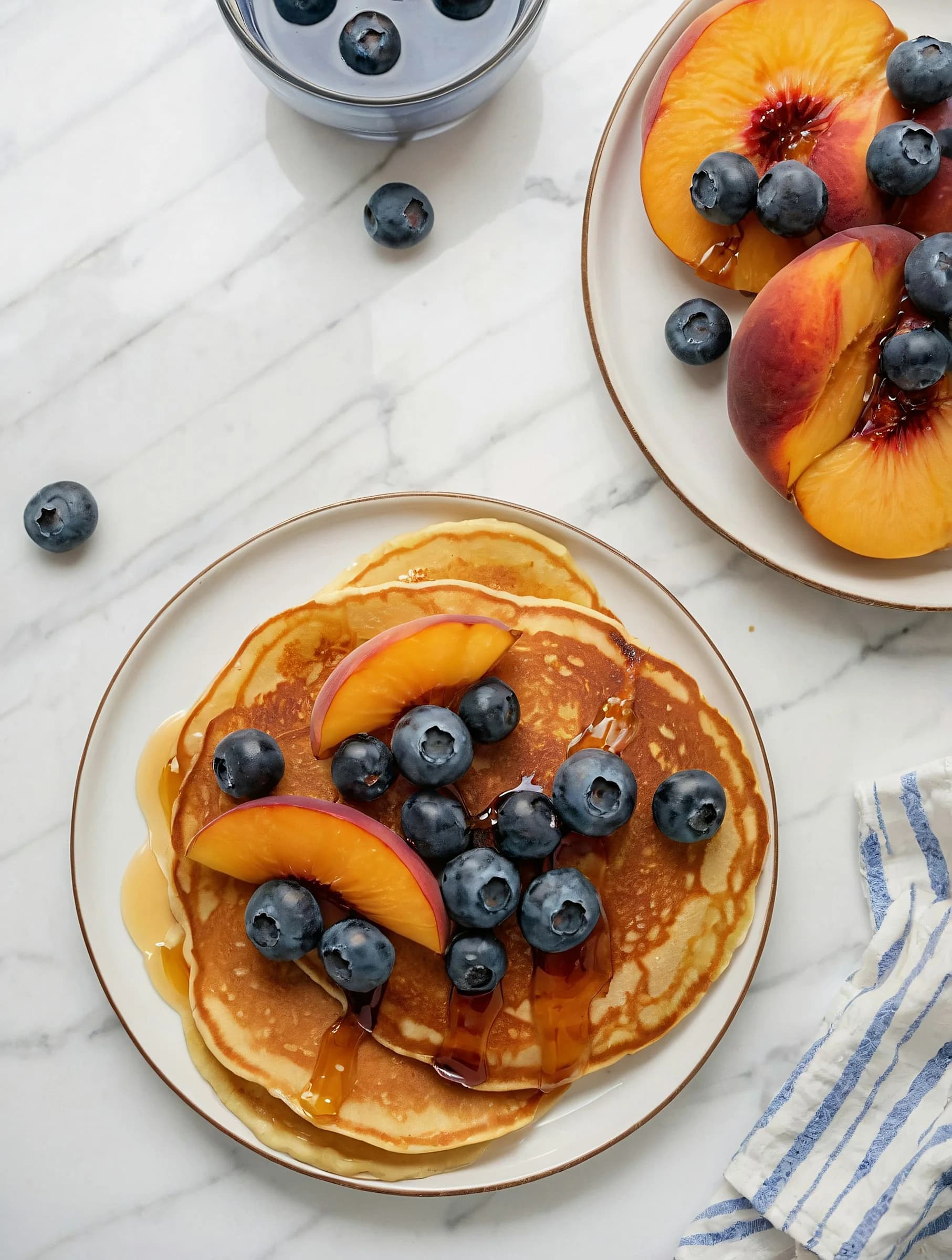 AI-generated pancakes topped with fruit and syrup